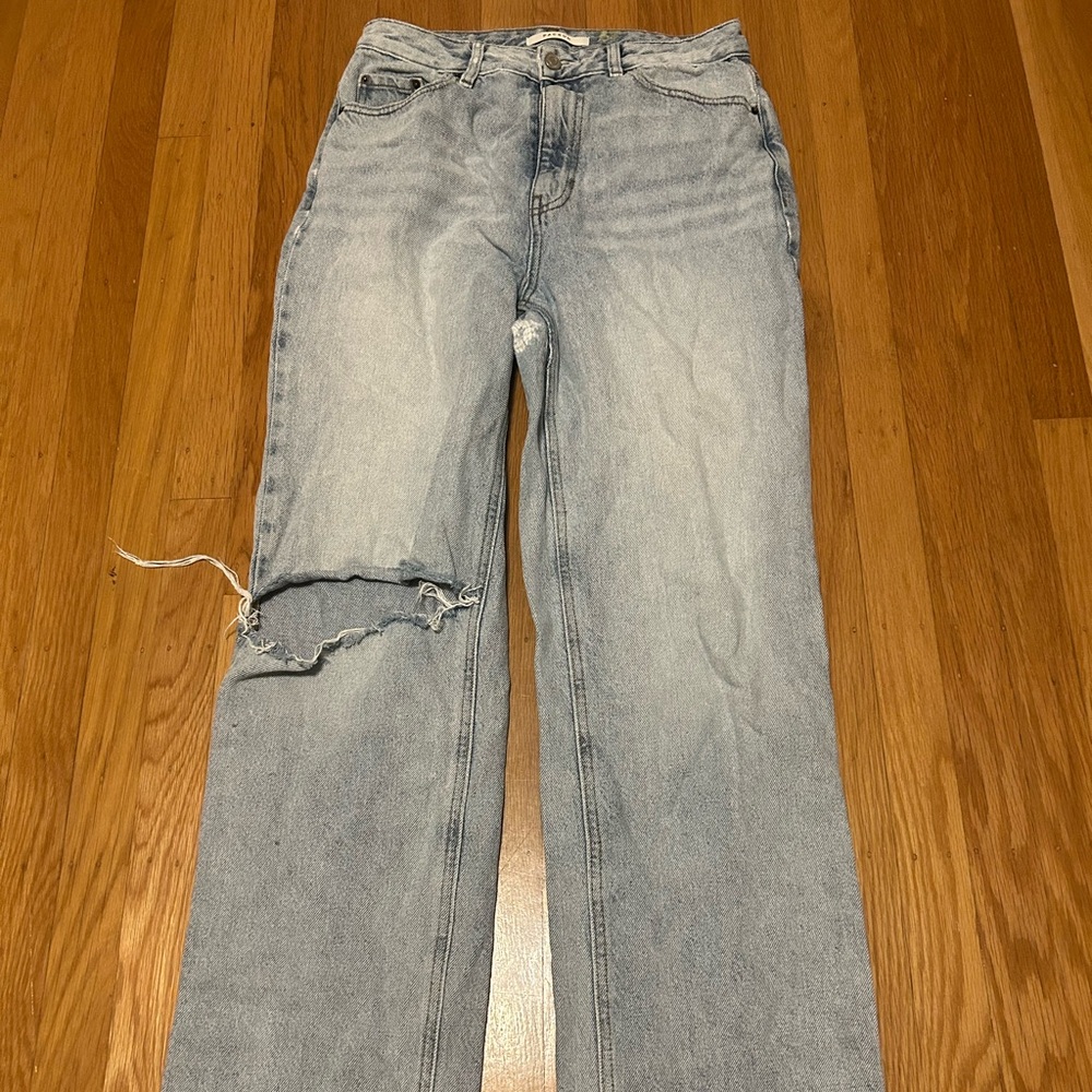 size 28 pacsun boyfriend jeans..There is a patched rip on the inner thigh.
